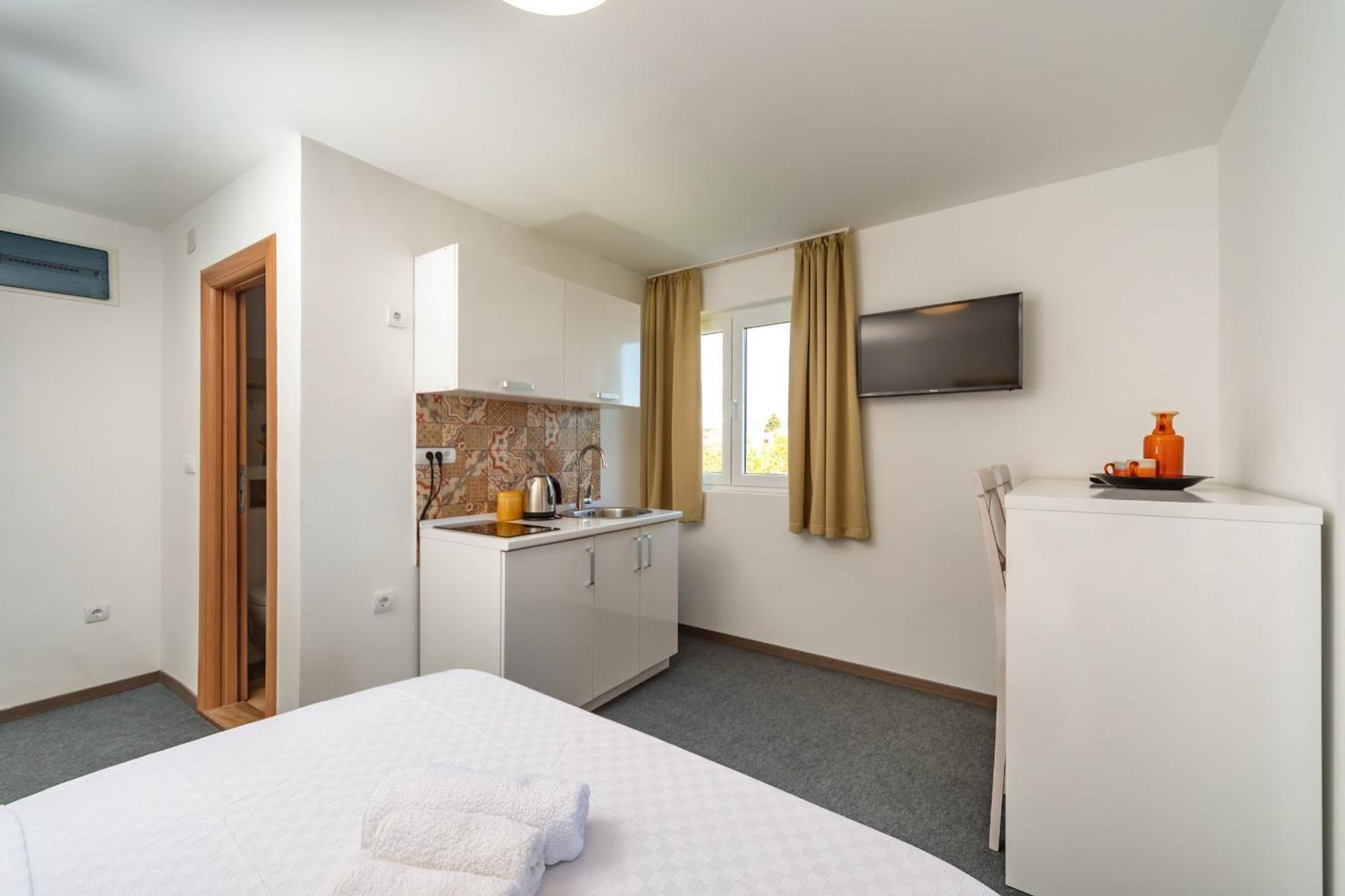 Mika'S Seaview Apartments บาร์ ห้อง รูปภาพ